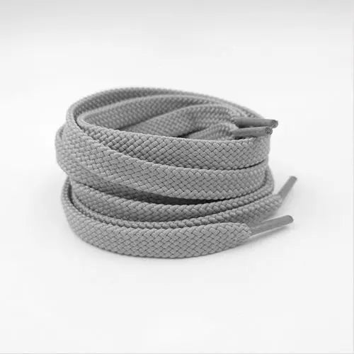 Light gray shoelace flat circular basketball sports running shoe board