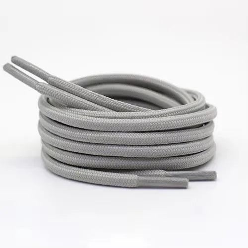 Light gray shoelace flat circular basketball sports running shoe board
