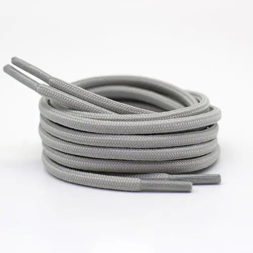 Light gray shoelace flat circular basketball sports running shoe board
