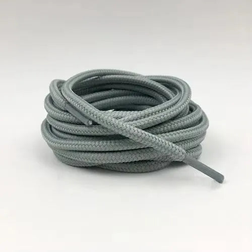 Light gray shoelace flat circular basketball sports running shoe board