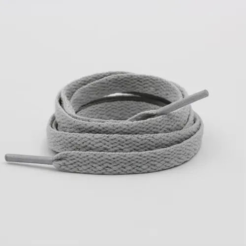 Light gray shoelace flat circular basketball sports running shoe board