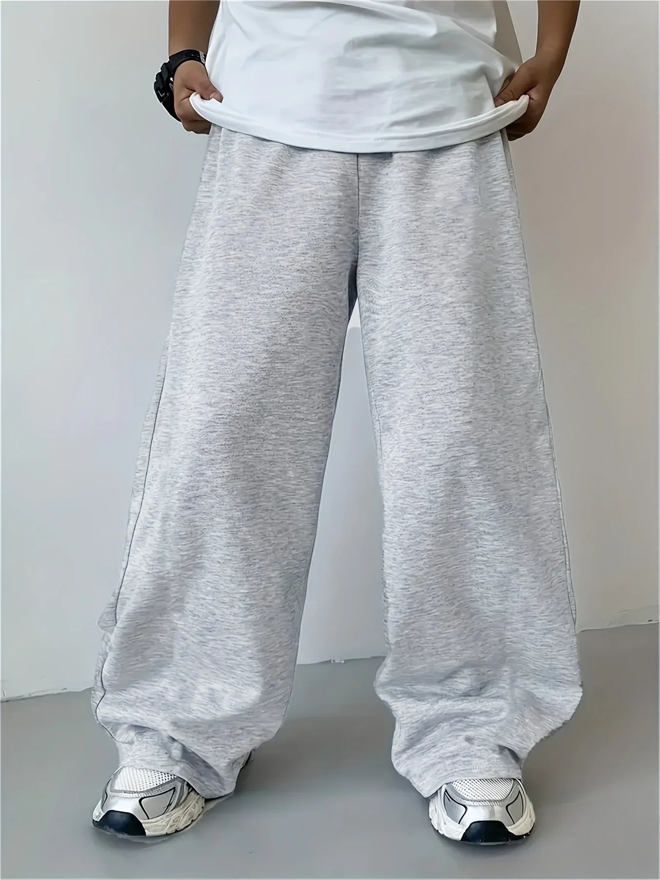 Loose, straight-leg gray trousers. Soft, everyday pants. Unisex