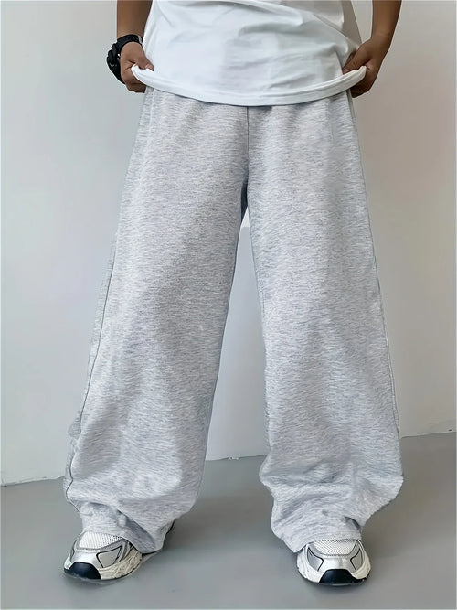 Loose, straight-leg gray trousers. Soft, everyday pants. Unisex