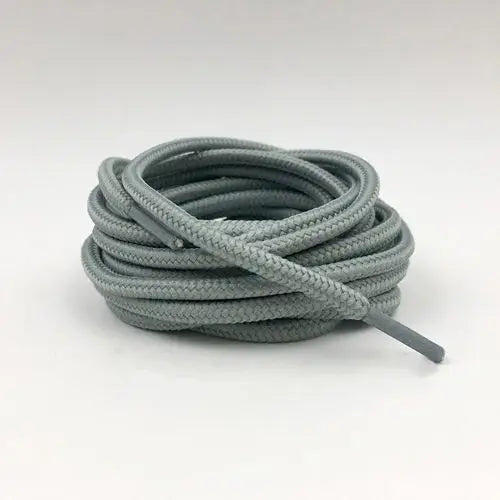 Light gray shoelace flat circular basketball sports running shoe board